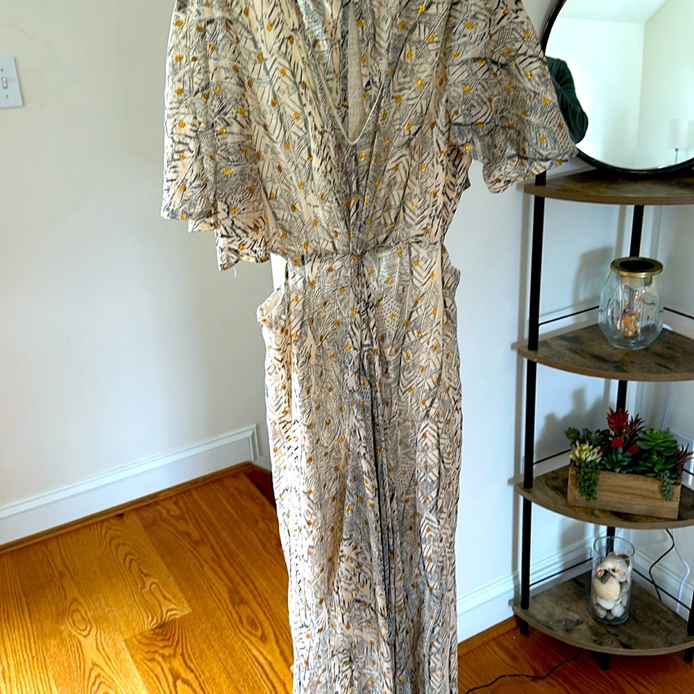 Cream colored mainstrip maxi dress with gold accents